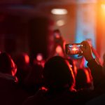close-up-recording-video-with-smartphone-during-concert